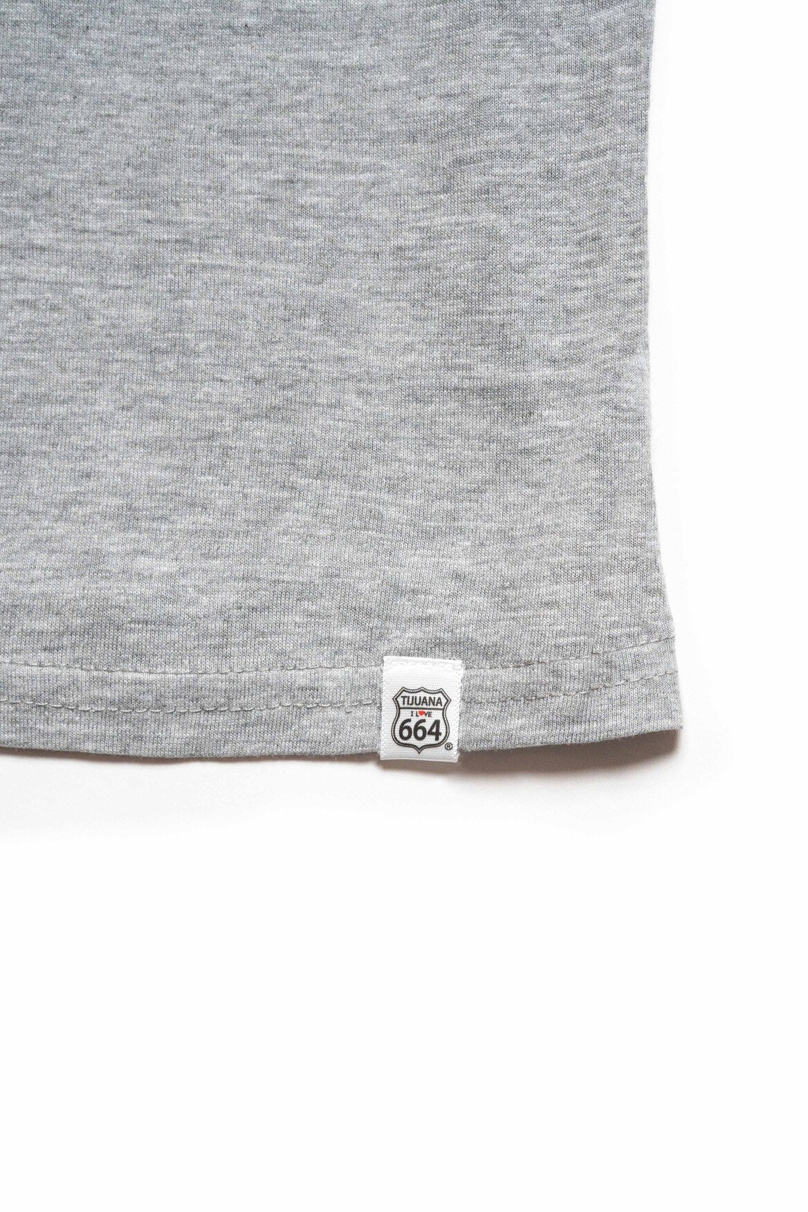 PLAYERA MUJER TJ - GRIS